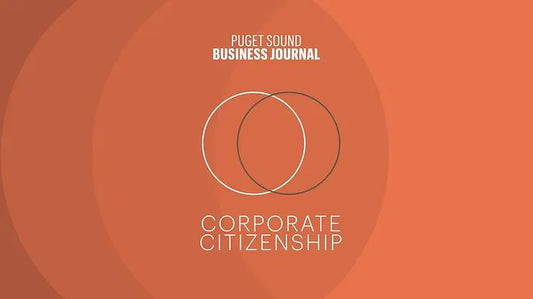 A Puget Sound Business Journal graphic on an orange background reading "Corporate Citizenship."